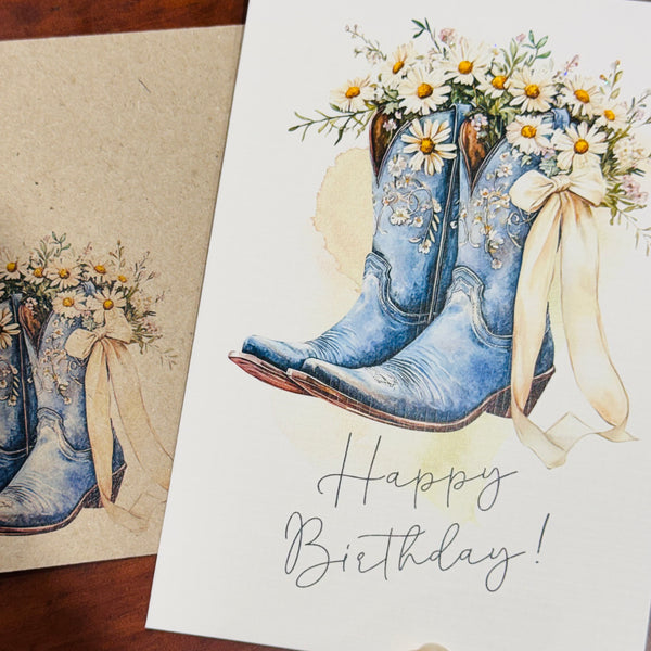Cowgirl boots & daisies greeting card