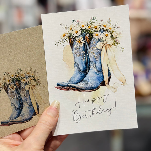 Cowgirl boots & daisies greeting card